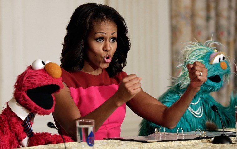 Image: Michelle Obama Joins Sesame St Characters At White House Garden Fall Harvest